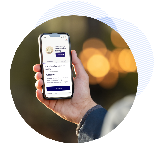 a hand holding a phone with a SilverCloud platform on