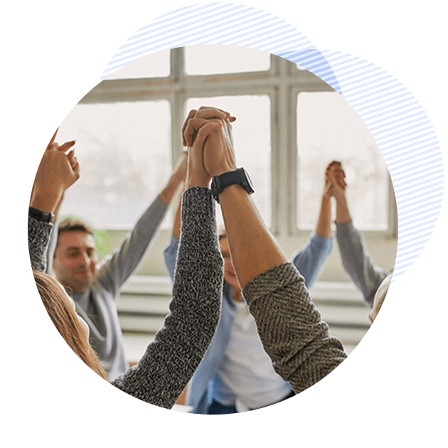 people holding hands - support group