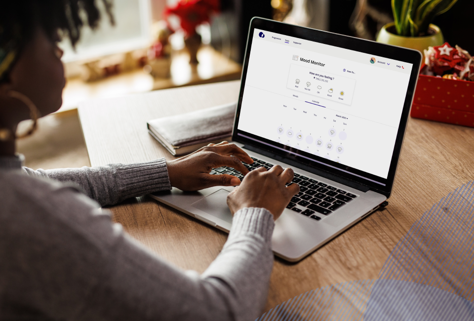 woman using silvercloud on her laptop